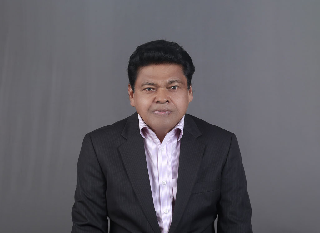 Dr. Raju M. Mathew
